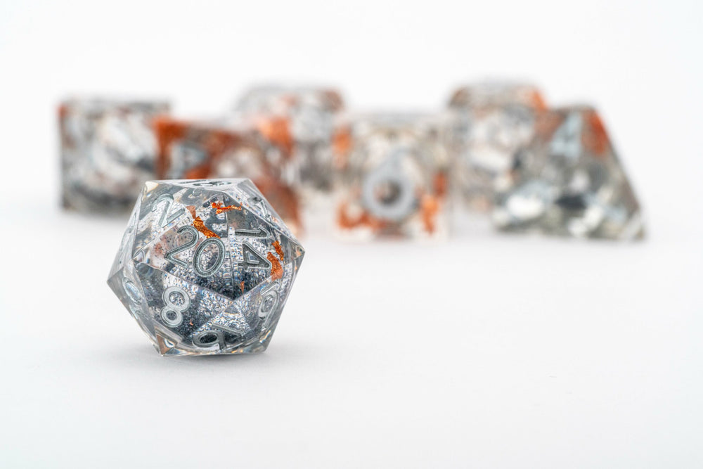 Dice Metallic Dice Co: Poly 7 Set Elixir - Sharp Edge Liquid Core