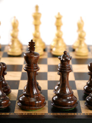 Chess Set 4" Exclusive Ajanwood and Natural Boxwood Pieces on Ebony and Birdseye board.